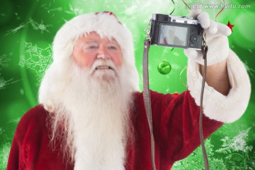 圣诞老人拿着相机自拍的复合形象