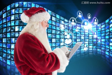 圣诞老人使用平板电脑的复合形象