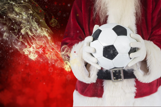 圣诞老人拿着足球的复合形象