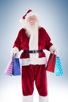 圣诞老人拎着礼物袋的复合形象