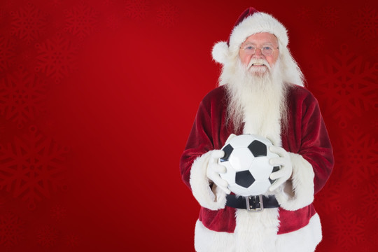 圣诞老人拿着足球的复合形象