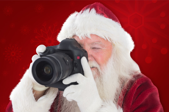 圣诞老人拿着相机的复合形象