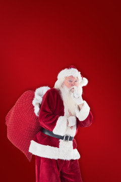 圣诞老人背着礼物袋的复合形象