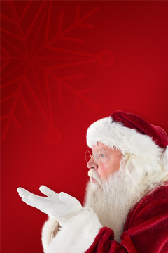 圣诞老人对着手掌吹气的复合形象
