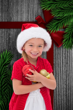 可爱的小女孩戴着圣诞帽