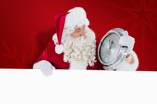圣诞老人拿着钟的复合形象