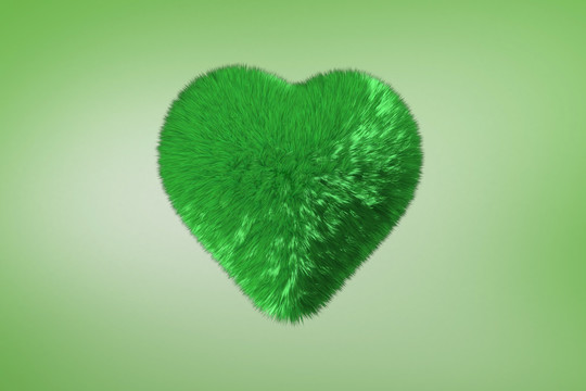 绿色爱心在绿色背景下