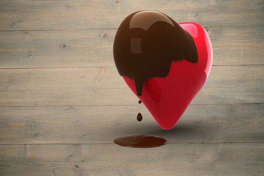 心蘸巧克力在木板背景下