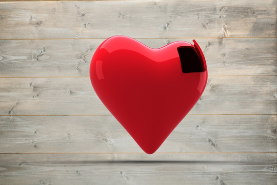 红色的心在灰色木板上