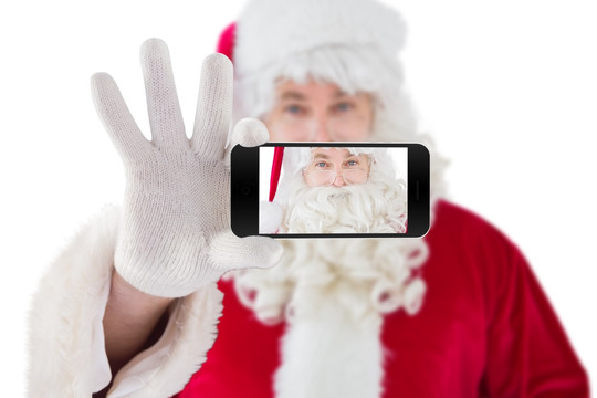 拿着手机自拍的圣诞老人