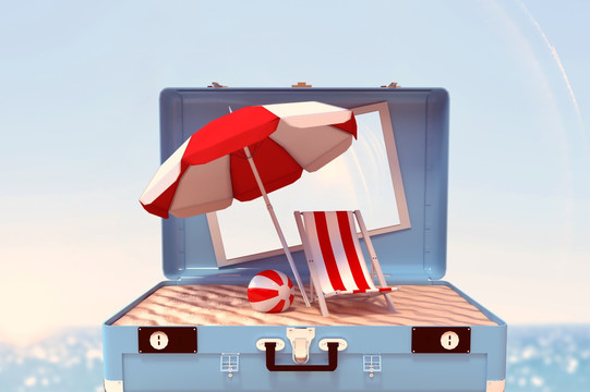 旅行箱里的沙滩椅和遮阳伞