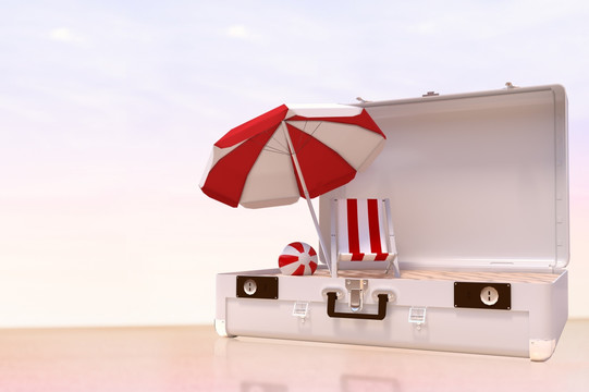 旅行箱里的沙滩椅和遮阳伞