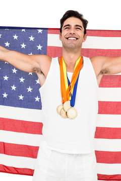 胜利后的男运动员拿着美国国旗