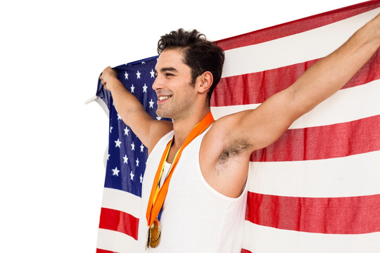 胜利后的男运动员拿着美国国旗