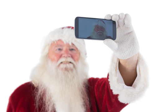 拿着手机的圣诞老人
