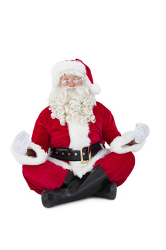 盘腿坐在地上的圣诞老人