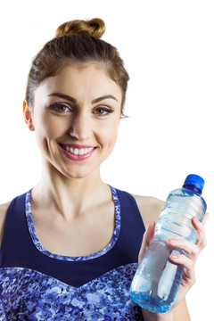 微笑着拿着水瓶的健身女人