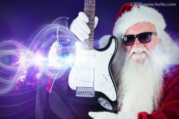 拿着电吉他的圣诞老人