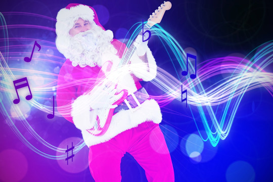 弹着电吉他的圣诞老人