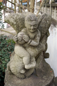 川西民俗雕塑 童子戏水石雕