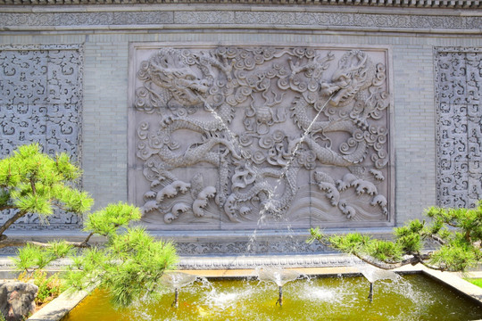 唐语砖雕双龙戏珠照壁