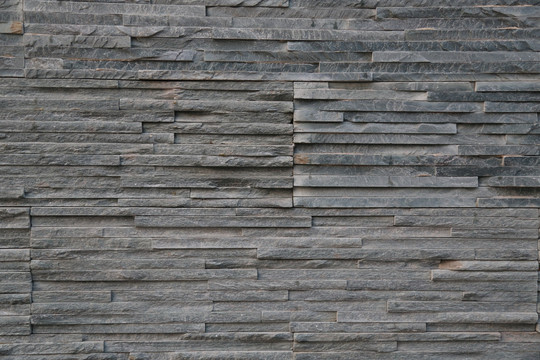 长条形大理石组成的墙面背景