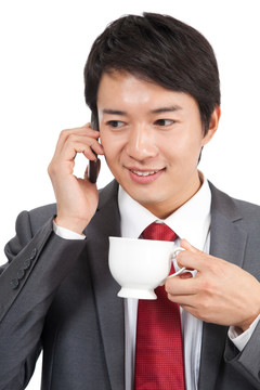 棚拍商务装年轻男人打电话 喝咖啡