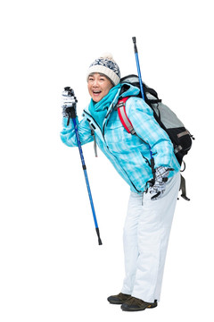 老年女人冬季登山旅行