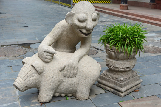 现代石雕艺术 养猪人