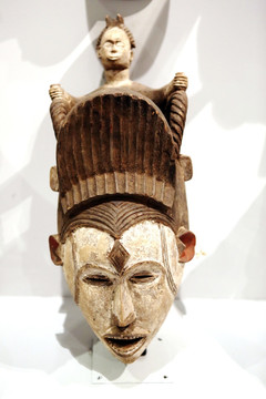 非洲洲雕刻戴帽鼎小人面具