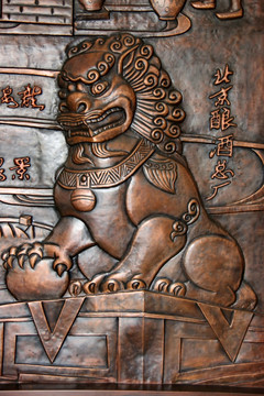 铜雕壁刻绣球狮子