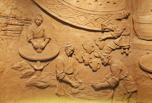 古人制作陶器壁刻