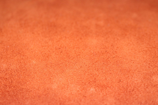 橘红磨砂底纹背景