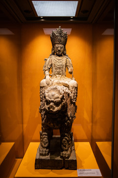 木雕文殊菩萨骑狮像