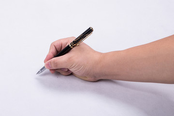 手握钢笔写字