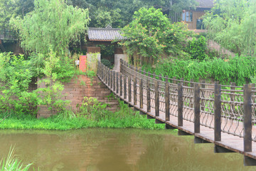 五凤溪古镇柳溪河上的索桥