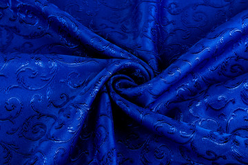 深蓝色暗花化纤窗帘布背景