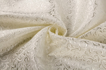 米色带花化纤半透明窗帘布背景