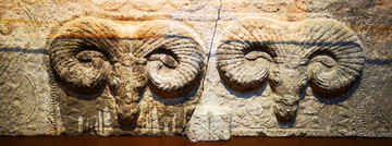 汉代双羊头图案画像石
