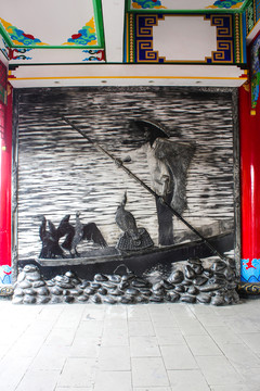 渔夫捕鱼浮雕墙
