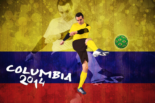 哥伦比亚国旗背景下运动员踢足球