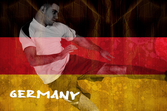 德国国旗背景下的足球运动员