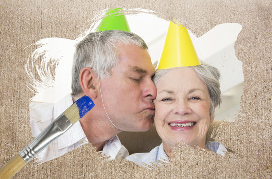 画笔框下庆祝生日的老夫妇