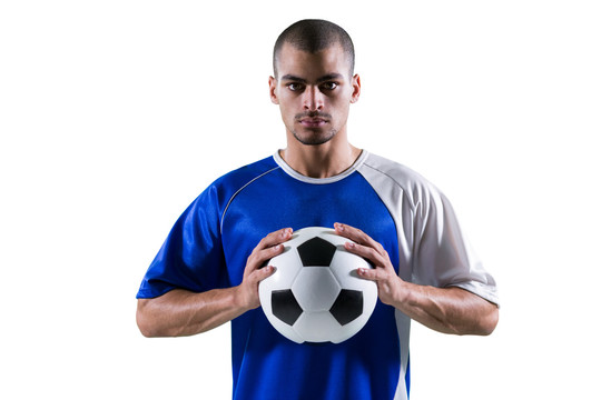 双手抱足球的足球运动员的肖像