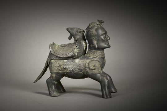 人首兽身尊