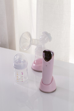 粉色电动吸奶器