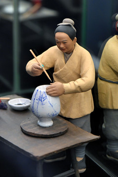 古代陶瓷工人上釉作业场景