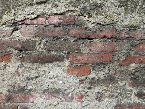 裸露的红砖墙粗糙的水泥