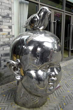 洛带古镇中国艺库不锈钢雕塑