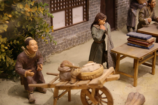 辽东马市泥塑卖布匹